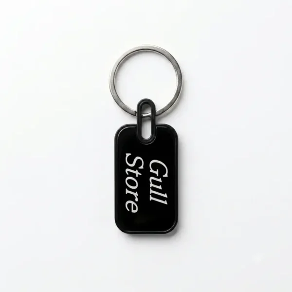 Custom laser engraved black metal keychain with plastic border - bulk order Pakistan - GullStore